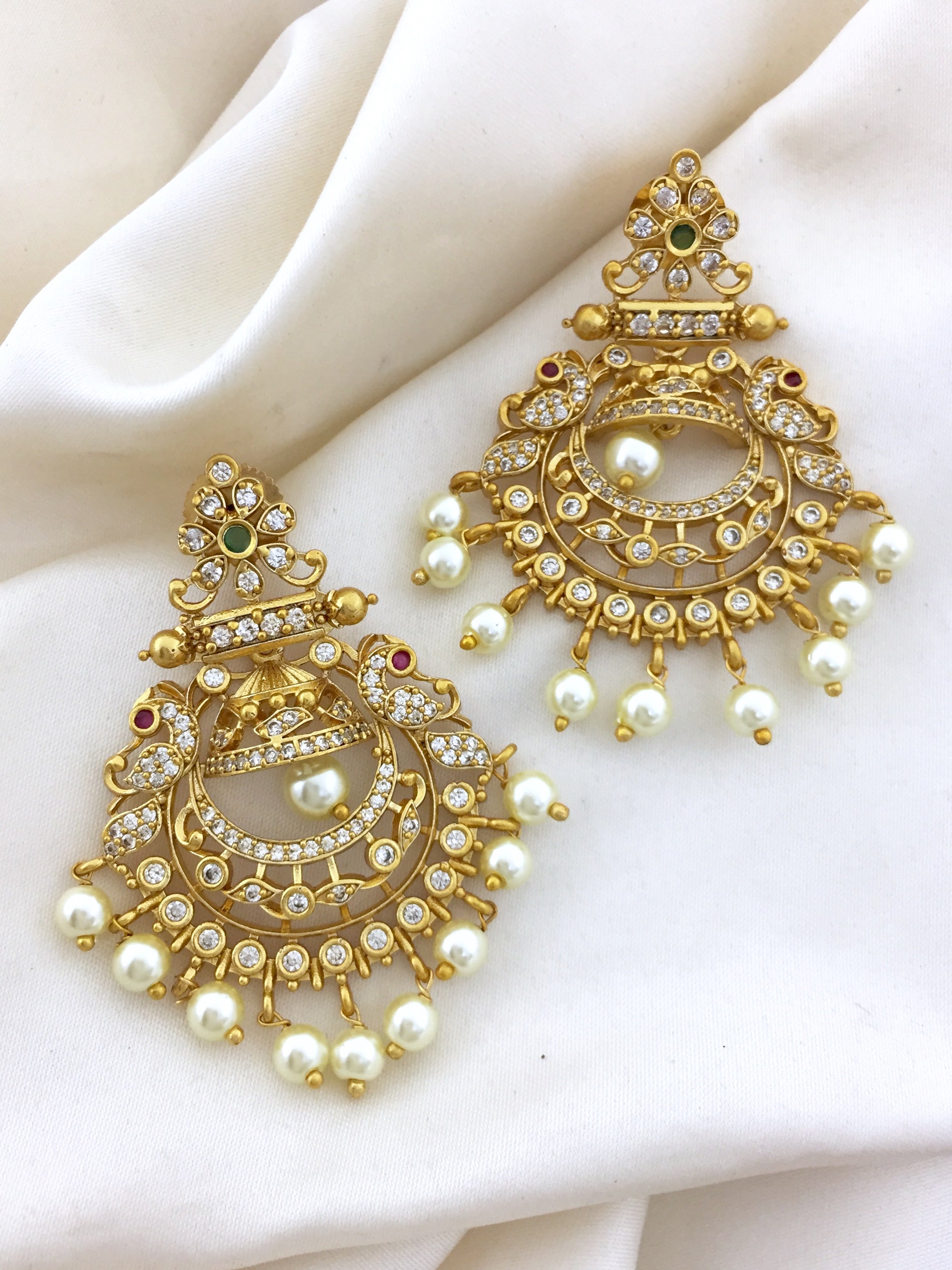 Designer white stone studded earrings with maang tikka